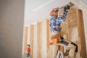 A man fixing the ceiling