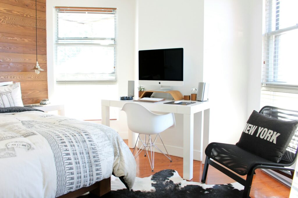 White wooden table with a laptop