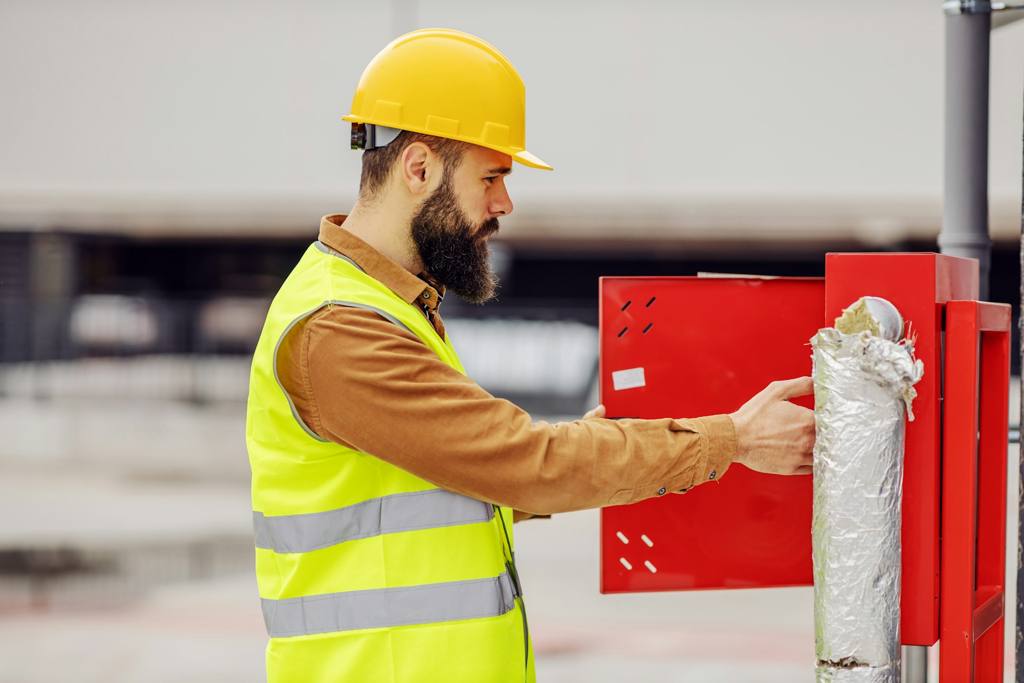 Person checking a machine