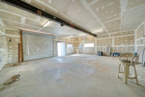 Large room with lots of white patches