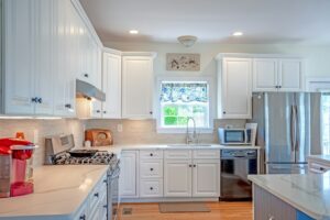 A photo of a white kitchen