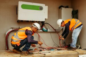 Two person working on electricity